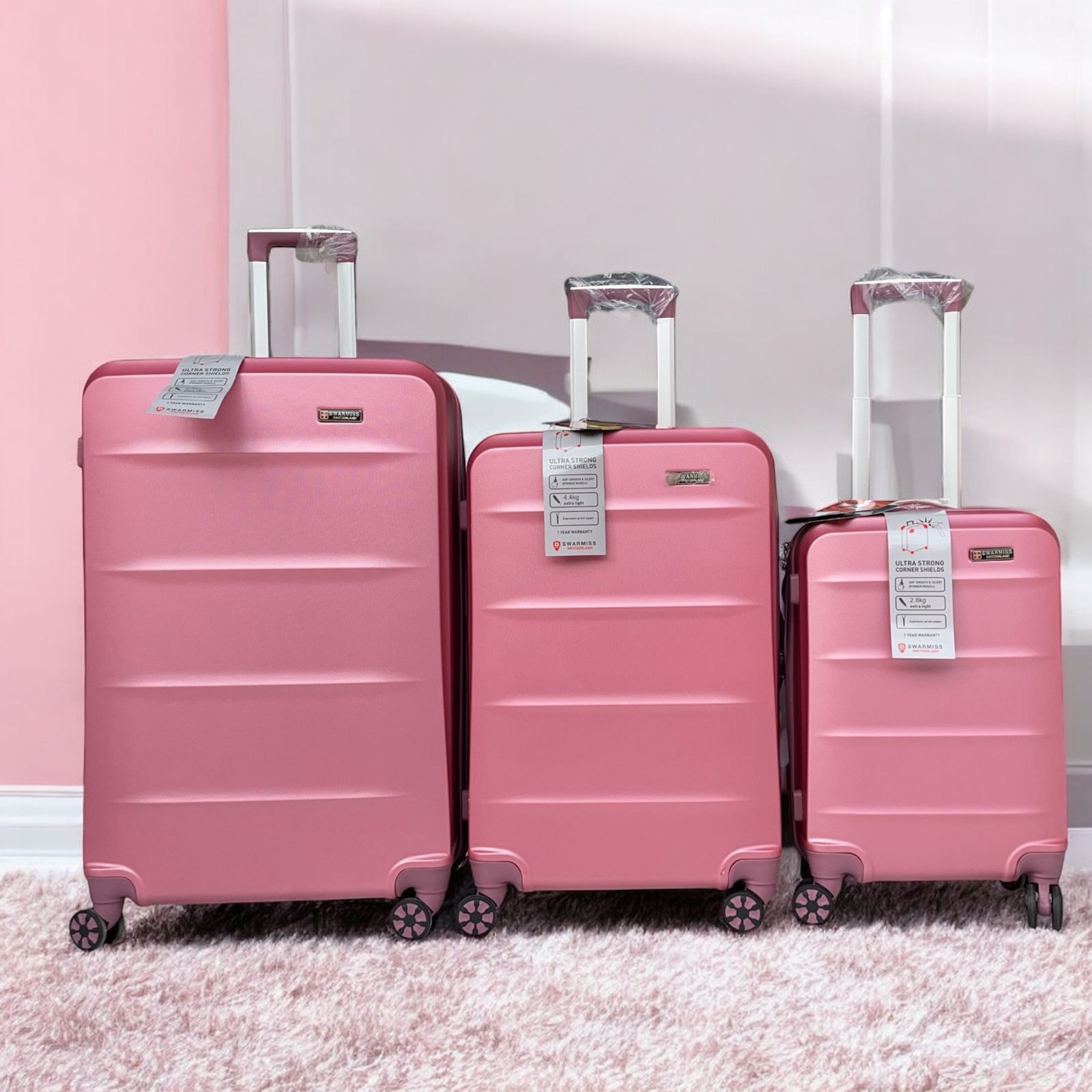 Swarmiss  Indestructible Hardshell Expandable Spinner Luggage, Pink